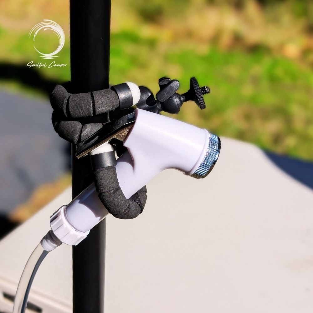 Fleximount wrapped around pole holding a shower nozzle