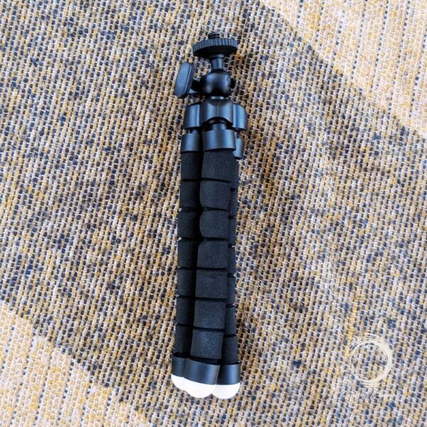 Compact FlexiMount tripod top view on textured mat, ideal for Silent Lantern and mounting applications