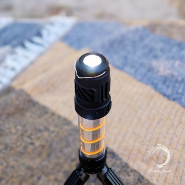Silent Lantern emitting bright white light on tripod, torch mode